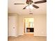 Neutral-toned bedroom with ceiling fan, closet, and doorway to bathroom at 984 Dinero Dr, Winter Springs, FL 32708
