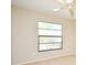 Bedroom with neutral walls, carpeted floors, ceiling fan, and natural light from a large window at 984 Dinero Dr, Winter Springs, FL 32708