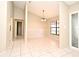 Inviting dining area with tile flooring, modern lighting, and a large window at 984 Dinero Dr, Winter Springs, FL 32708