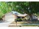 Charming single-story home with brick accents and a well-maintained front yard at 984 Dinero Dr, Winter Springs, FL 32708