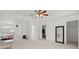 Spacious bedroom with tray ceilings and natural light near a large walk-in closet at 1240 Falconcrest Blvd, Apopka, FL 32712
