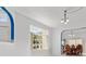 Bright dining room featuring modern chandelier and oversized windows at 1240 Falconcrest Blvd, Apopka, FL 32712
