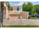 Spacious three-car garage on a lush manicured lawn at 1240 Falconcrest Blvd, Apopka, FL 32712