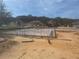 Suburban new construction shows foundation of multiple homes ready for framing with surrounding homes and sunny skies at 12818 Brunello Cir, Clermont, FL 34711