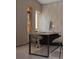 Contemporary home office with built-in storage, a modern desk, and ergonomic chair at 12818 Brunello Cir, Clermont, FL 34711