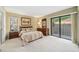 Spacious bedroom with sliding glass doors and ample natural light at 134 Heron Bay Cir, Lake Mary, FL 32746