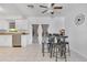 Bright breakfast nook with a granite-topped counter and access to the outdoors at 1340 Bakersfield Ave, Deltona, FL 32725