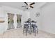 Cozy breakfast nook featuring tiled floors, a table with barstools, and access to the lanai at 1340 Bakersfield Ave, Deltona, FL 32725