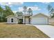 Inviting single-Gathering home with a two-car garage and a well-manicured lawn at 13881 Sw 80Th Ave, Ocala, FL 34473