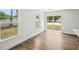 Open-concept dining space with recessed lights and wood-look flooring at 13881 Sw 80Th Ave, Ocala, FL 34473