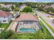 Lovely home featuring a screened-in pool, manicured landscaping, and great curb appeal in a desirable neighborhood at 14003 Sobrado Dr, Orlando, FL 32837