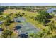Aerial view of the community basketball courts with palm trees nearby at 14003 Sobrado Dr, Orlando, FL 32837