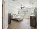 Bedroom with tile floors, a ceiling fan, and bright windows with plantation shutters at 14003 Sobrado Dr, Orlando, FL 32837