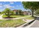 Inviting single-story home featuring lush landscaping and an attached two-car garage at 14003 Sobrado Dr, Orlando, FL 32837