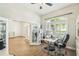 This office boasts wood floors, a desk, and a bright window for a productive work environment at 14003 Sobrado Dr, Orlando, FL 32837