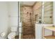 Modern tiled shower with dual shower heads and a built-in niche at 14003 Sobrado Dr, Orlando, FL 32837