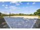 Well-maintained sand volleyball court in a sunny community setting with lush landscaping at 14003 Sobrado Dr, Orlando, FL 32837