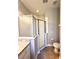 Bathroom with a shower, toilet, vanity with sink, and an exhaust fan at 14479 Tanja King Blvd, Orlando, FL 32828