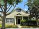 Charming single-Gathering home featuring mature trees and lush landscaping at 14479 Tanja King Blvd, Orlando, FL 32828