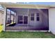 Enclosed patio area with a sliding door leading inside at 14479 Tanja King Blvd, Orlando, FL 32828