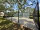 Community racquetball court enclosed with a chain-link fence, offering a recreational space for residents at 14479 Tanja King Blvd, Orlando, FL 32828