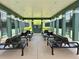 Covered seating area at tennis courts, providing shade and a comfortable space for spectators and players to relax at 14479 Tanja King Blvd, Orlando, FL 32828