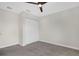 Carpeted bedroom with neutral walls, closet, and ceiling fan at 15060 Book Club Rd, Winter Garden, FL 34787