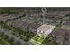 An aerial view highlights the property's location within a neighborhood of similar townhomes at 15060 Book Club Rd, Winter Garden, FL 34787
