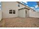 Private brick-paved patio with an entry door, surrounded by a white fence, perfect for outdoor relaxation at 15060 Book Club Rd, Winter Garden, FL 34787