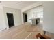 Open concept kitchen area with island, recessed lighting, and tiled flooring being prepared for installation at 15345 Burgtheater Dr, Winter Garden, FL 34787