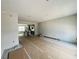 Open concept kitchen area with island, recessed lighting, and tiled flooring being prepared for installation at 15345 Burgtheater Dr, Winter Garden, FL 34787