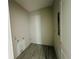 A functional laundry room with tile flooring; ready to be equipped at 15345 Burgtheater Dr, Winter Garden, FL 34787
