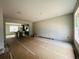 An open-concept living room with tile flooring and abundant natural light. Ready for personalization at 15345 Burgtheater Dr, Winter Garden, FL 34787