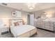 Cozy bedroom with neutral tones and comfortable furnishings at 1536 Groveline Rd, St Cloud, FL 34771
