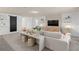 Spacious living room features neutral tones and comfortable seating at 1536 Groveline Rd, St Cloud, FL 34771