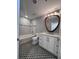 Modern bathroom with unique patterned floor and stylish vanity at 155 S Court Ave # 2406, Orlando, FL 32801