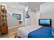 Bedroom with a platform bed and mid-century modern decor at 155 S Court Ave # 2406, Orlando, FL 32801