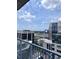 Breathtaking city view from the balcony showcasing the skyline and distant greenery at 155 S Court Ave # 2406, Orlando, FL 32801