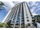 Modern high-rise condo building with balconies and a view of the city skyline at 155 S Court Ave # 2406, Orlando, FL 32801
