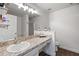 Bathroom featuring a vanity with a large mirror, a shower, and a toilet at 1552 Whooping Dr, Groveland, FL 34736
