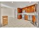 Open kitchen with stainless appliances at 15628 Hidden Lake Cir, Clermont, FL 34711