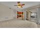 Open-concept living space transitions to outdoor patio at 15628 Hidden Lake Cir, Clermont, FL 34711
