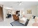 Spacious open floor plan combining the kitchen, dining, and living areas with stylish decor and modern finishes at 1596 Moon Valley Dr, Davenport, FL 33896