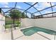 Fully screened backyard pool area with seating, great for privacy and outdoor enjoyment at 1596 Moon Valley Dr, Davenport, FL 33896