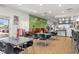 Clean restaurant and bar area with abundant seating and stainless steel kitchen at 1596 Moon Valley Dr, Davenport, FL 33896