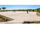 Sandy volleyball court for community gatherings at 1596 Moon Valley Dr, Davenport, FL 33896