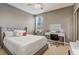 Bright bedroom with a comfortable bed, desk, vanity and ceiling fan at 17084 Harbor Oak Pkwy, Winter Garden, FL 34787