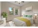 Bright bedroom featuring large windows, ceiling fan, neutral paint, and stylish furnishings at 17084 Harbor Oak Pkwy, Winter Garden, FL 34787
