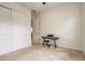 Simple bedroom with carpet, open closet and a modern electronic piano at 17084 Harbor Oak Pkwy, Winter Garden, FL 34787