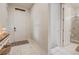 Bright entryway featuring tile flooring, front door with sidelight, console table and adjacent bathroom at 17084 Harbor Oak Pkwy, Winter Garden, FL 34787